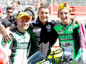 Talmacsi, Boscoscuro and Iannone at the parc fermé after Moto2 race at Motorland Aragón