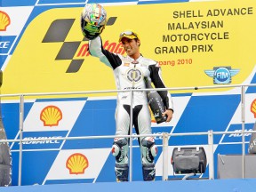 2010 Moto2 World Champion Toni Elías on the podium at Sepang