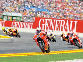 Casey Stoner riding ahead of MotoGP group in Valencia