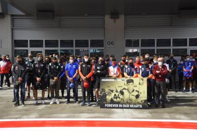 The #MotoGP paddock got together for a minute of silence